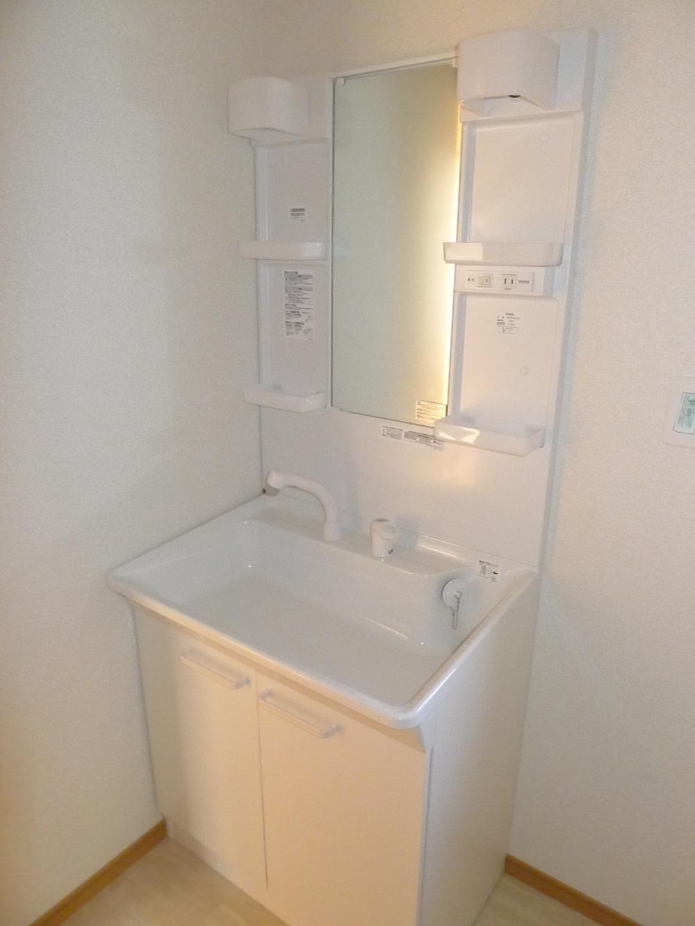 Wash basin, toilet. Happy shampoo dresser in a busy morning!