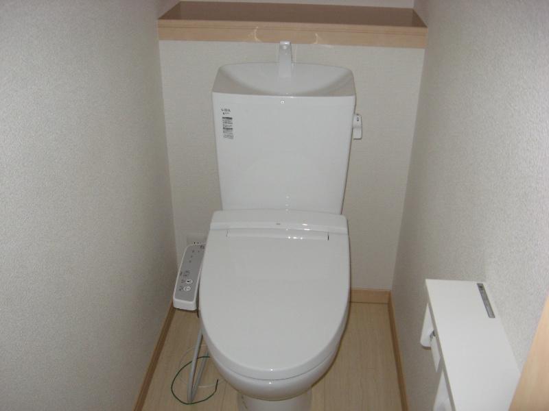 Toilet. Hot water function with toilet