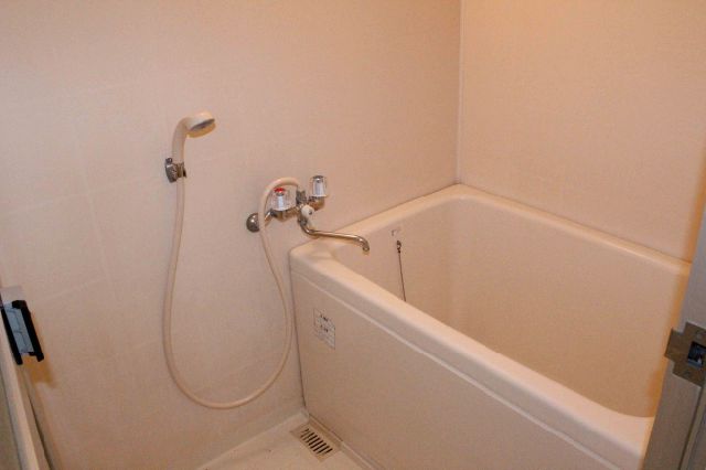 Bath. Contact is a bathroom with shower