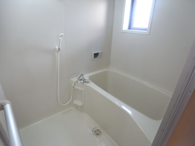Bath. It is a bathroom with a window