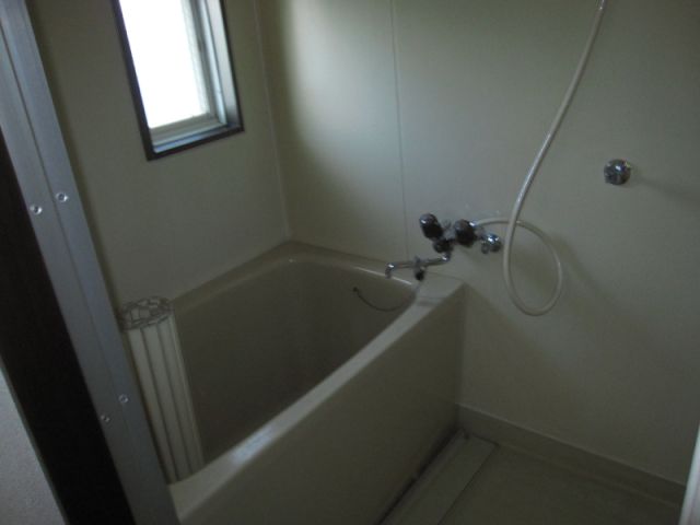 Bath. Bath equipped with a small window