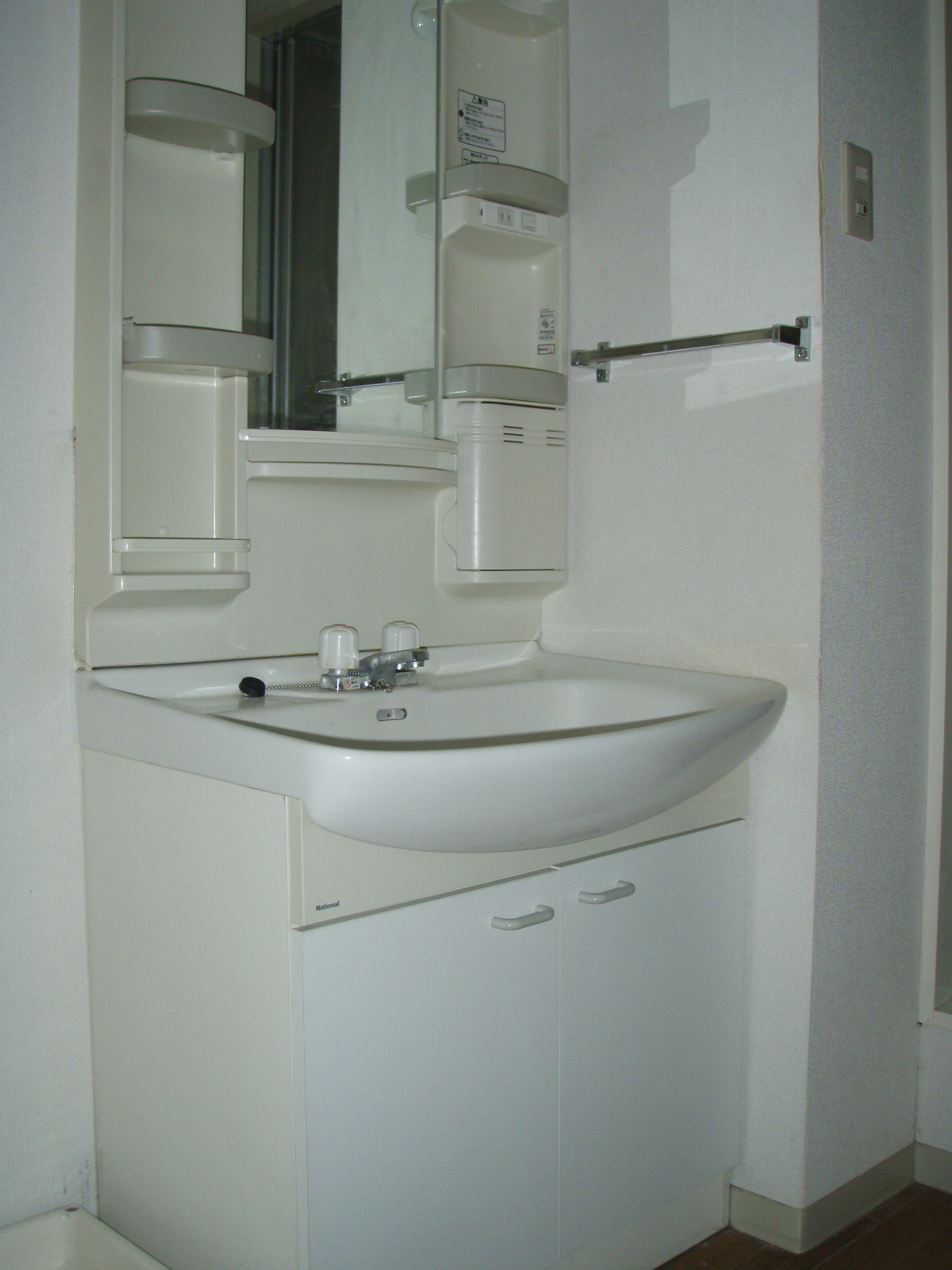 Washroom. Independent basin with vanity There yard indoor washing machine