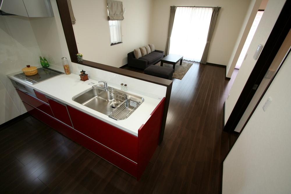 Kitchen. Overlooking the living room from the kitchen. The kitchen is functional Panasonic living station. 