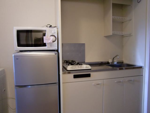 Kitchen. refrigerator, Microwave is also equipment