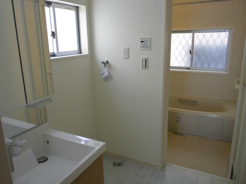 Wash basin, toilet. Wash