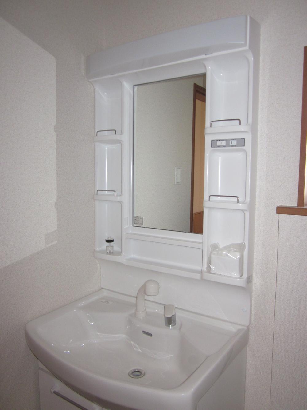 Wash basin, toilet. Bathroom vanity