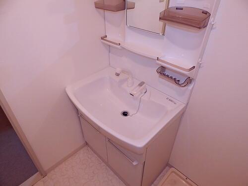 Wash basin, toilet. Bathroom vanity