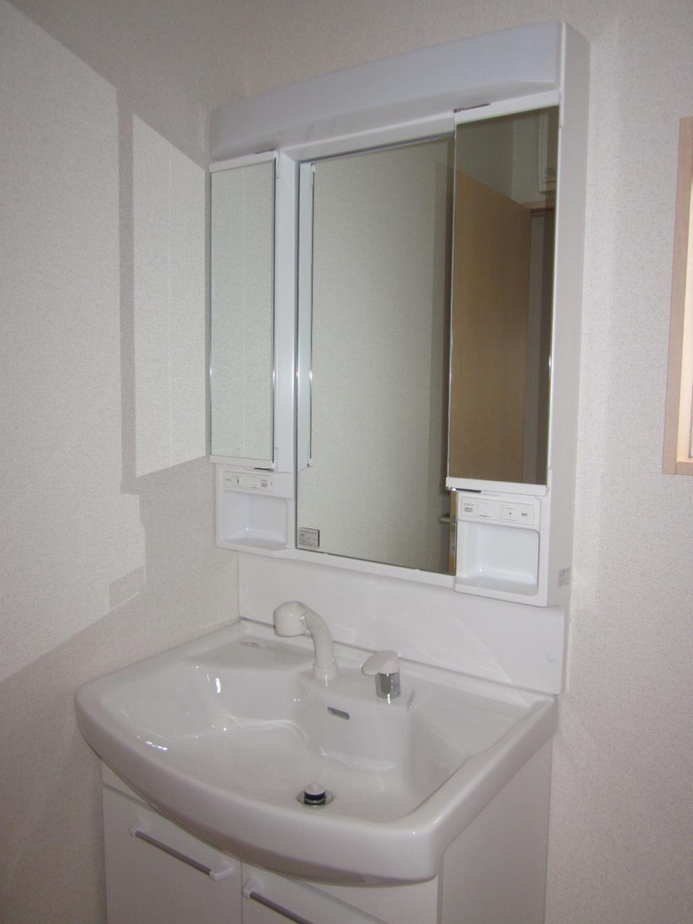 Wash basin, toilet. Bathroom vanity