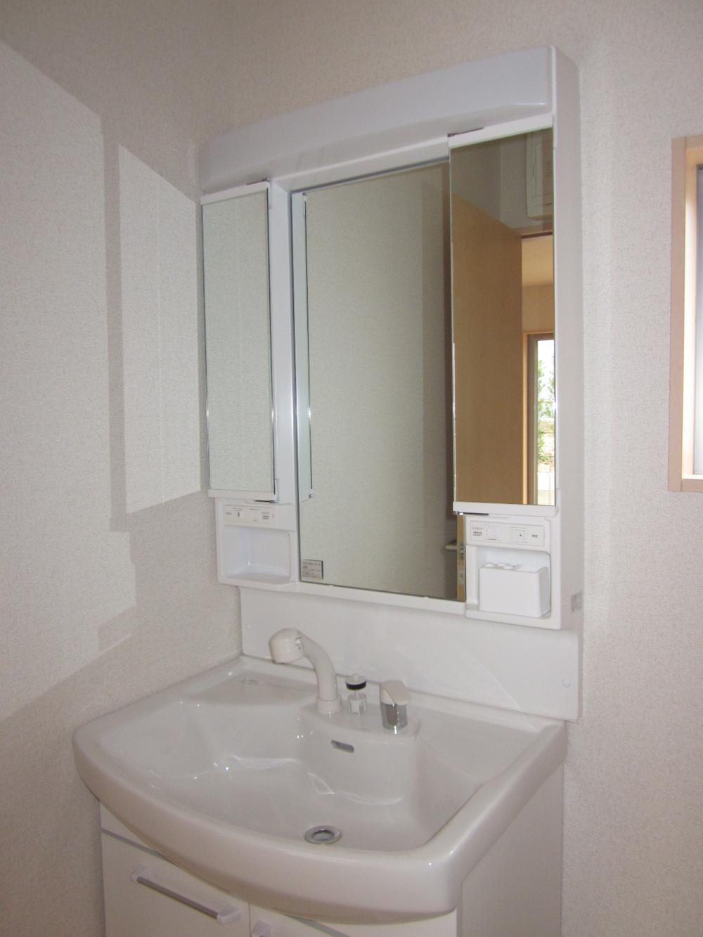 Wash basin, toilet. Bathroom vanity