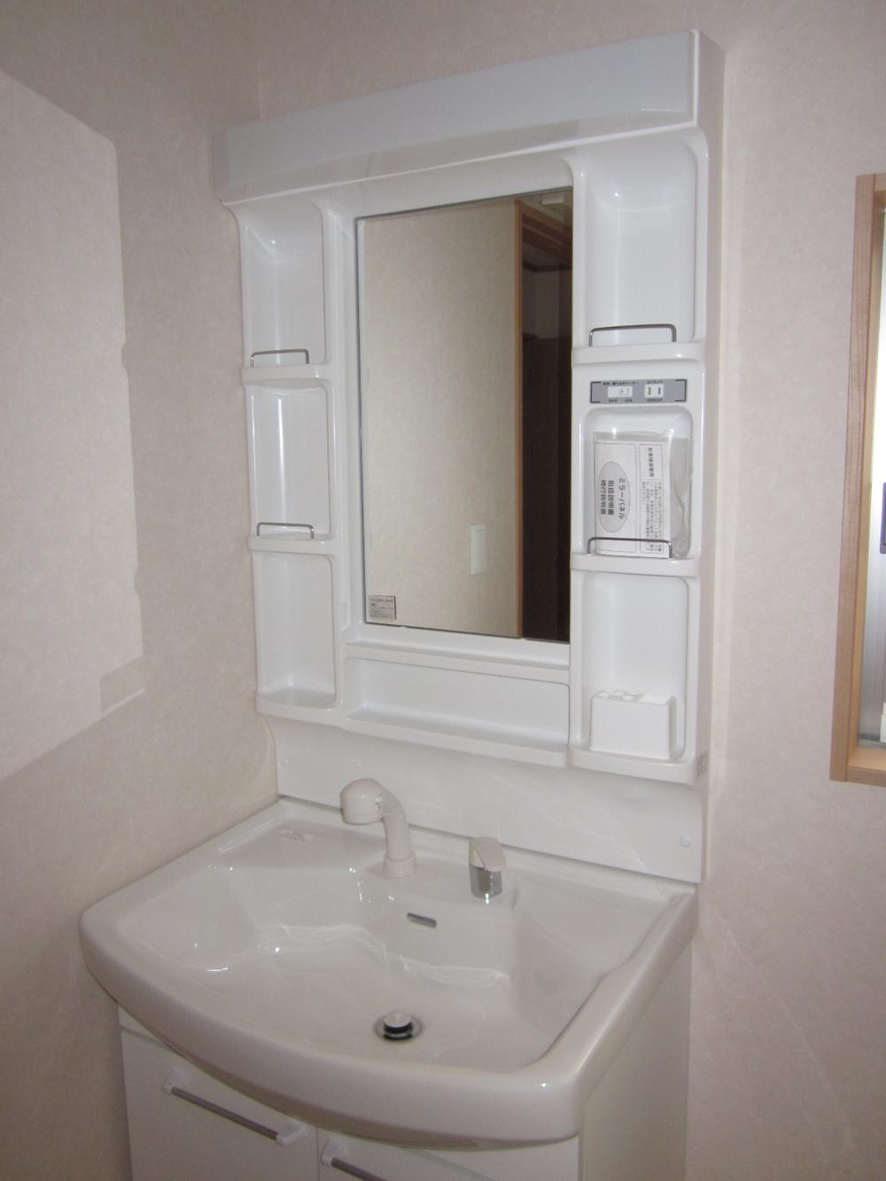 Wash basin, toilet. Bathroom vanity