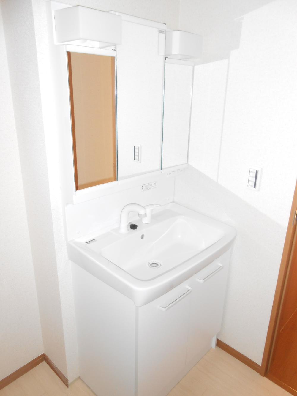 Wash basin, toilet. Shampoo dresser vanity