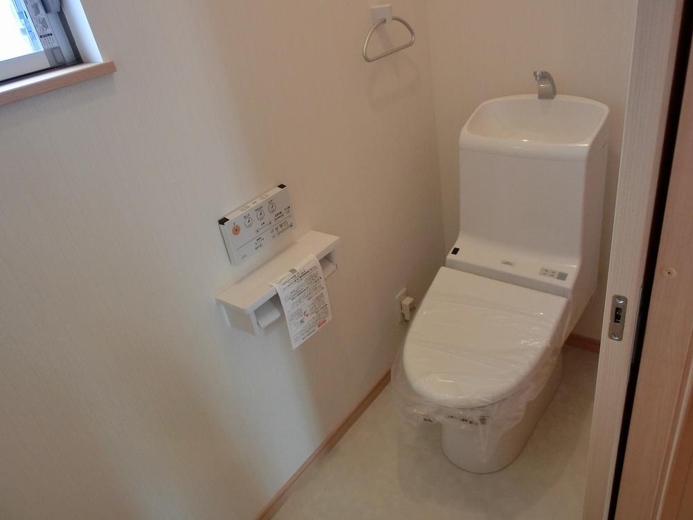 Toilet. Same type model