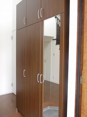 Entrance. Cupboard is also large. Storage space is also rich. 