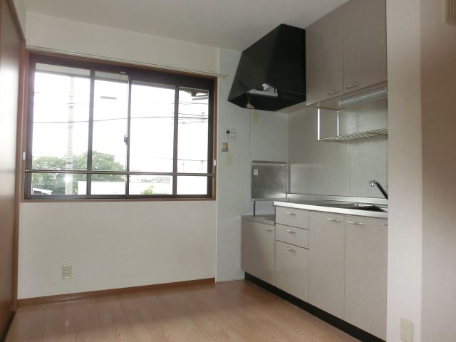 Living and room. Dining space with windows that allow natural light. 