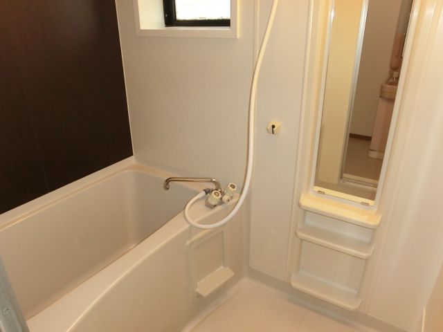 Bath. It is a bathroom with a ventilation easy small window