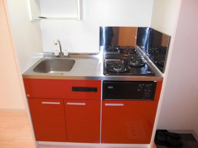 Kitchen. Colorful kitchen space, Gas stove has 2 burners equipped! 