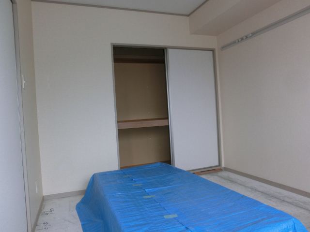 Living and room. Is a Japanese-style room, complete with storage.