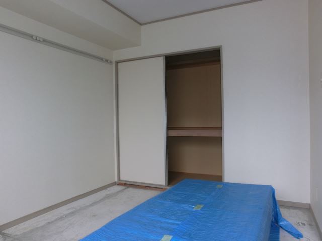 Living and room. Is a Japanese-style room, complete with storage.