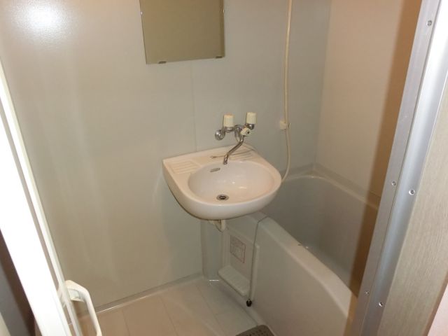 Bath. Miller & is a bathroom with a wash basin! 