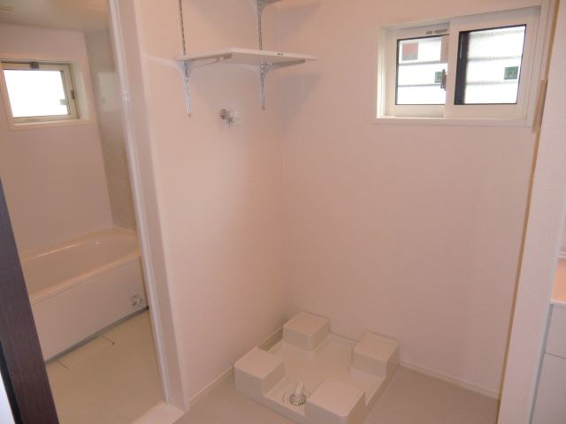 Other room space. It is indoor washing machine Storage! 