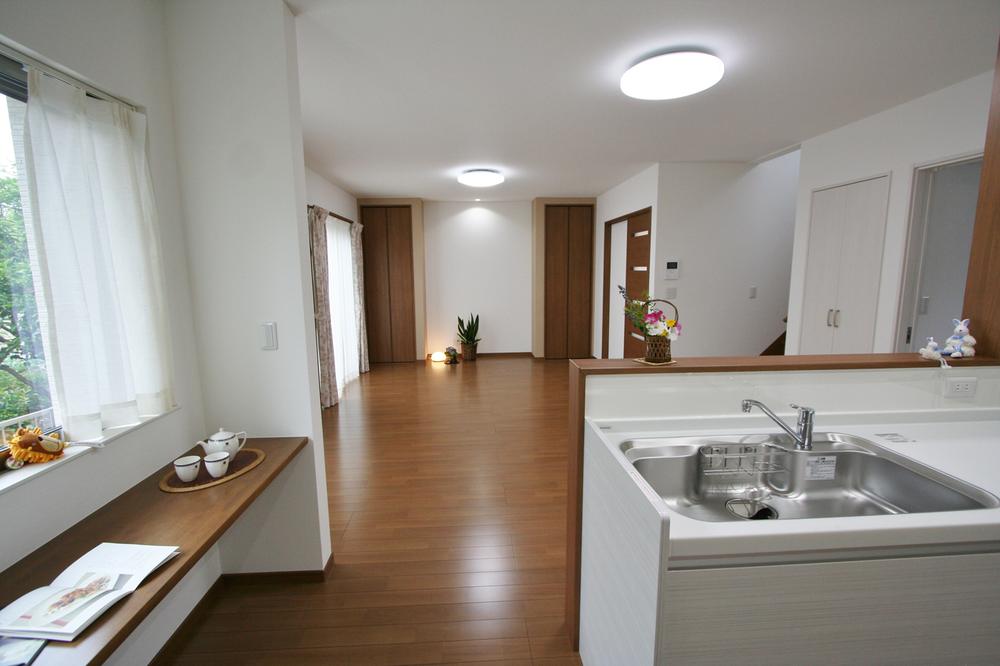 Living.  [Building C Living] Convenient counter space next to the kitchen. Also dishes while examining the recipes at the counter. 