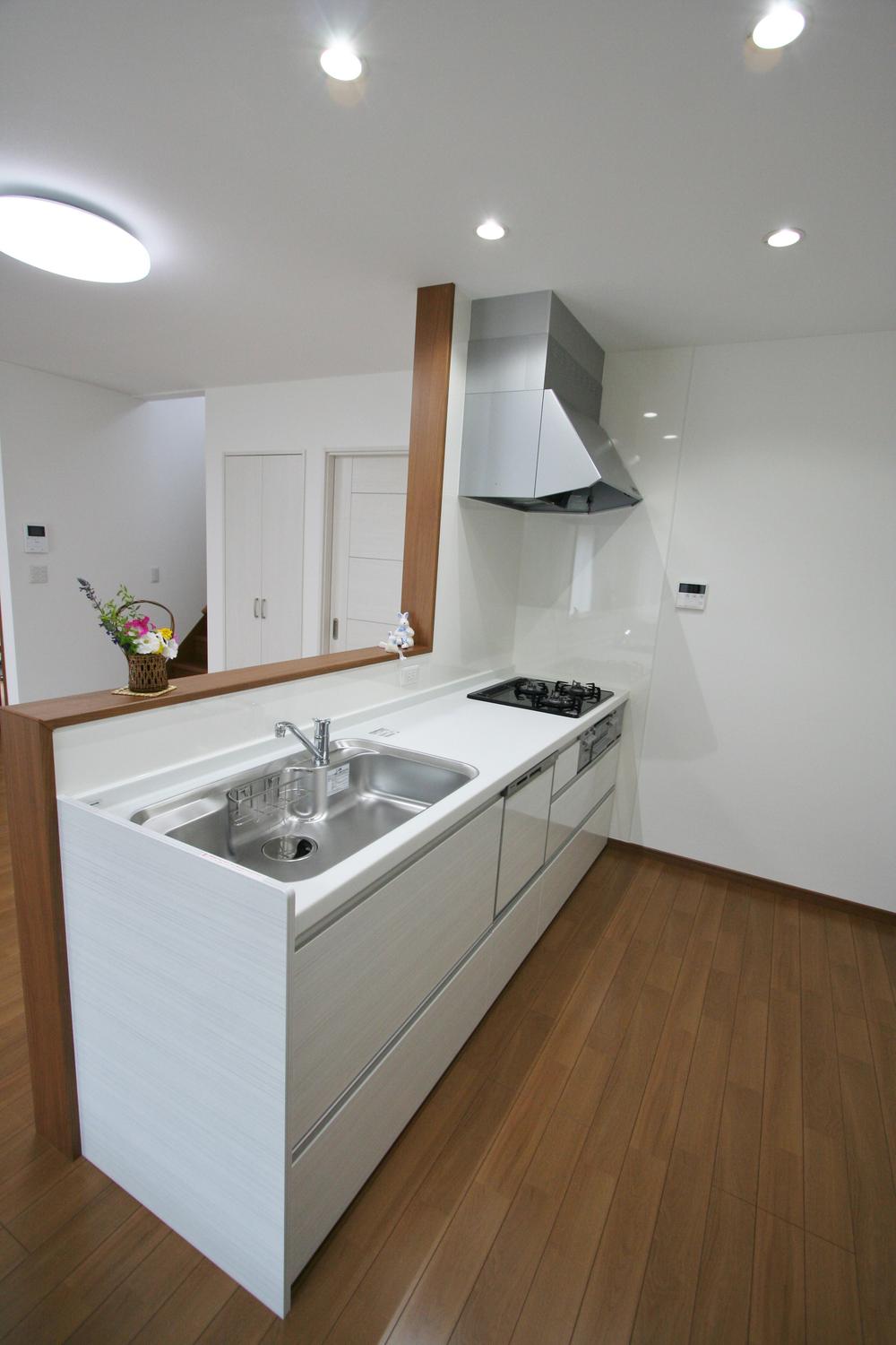 Kitchen.  [Building C Kitchen] Functional Panasonic living station, Dishwasher ・ Glass top gas stove