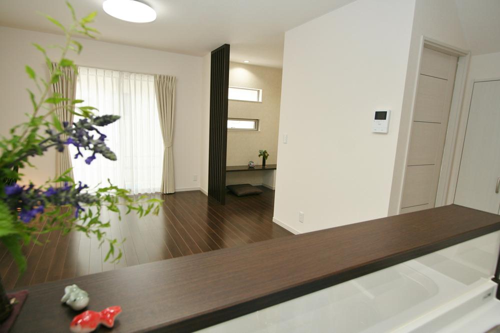 Living.  [Building B Living] Relaxed atmosphere on the floor of mature dark shades. 