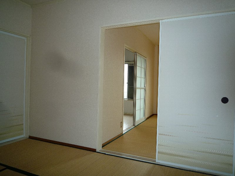 Other room space. It shines white cross in retro tatami. 