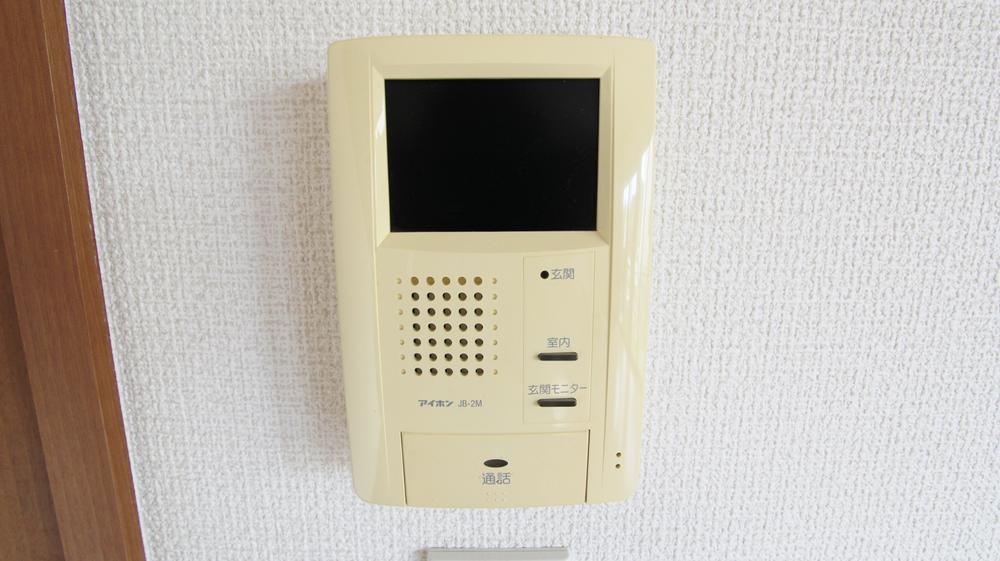 Security equipment. T monitor phone that visitors can confirm