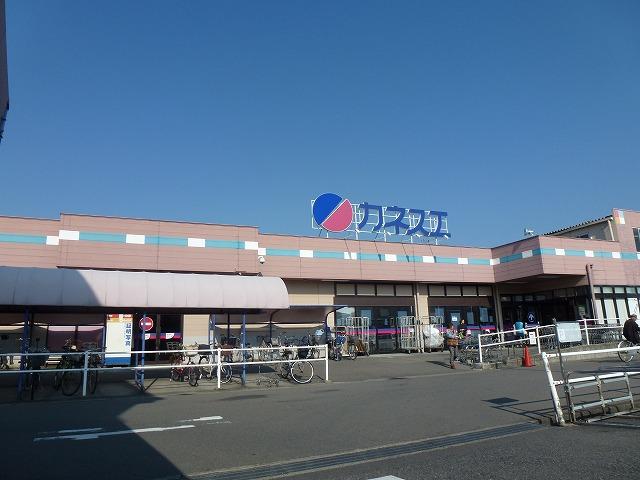 Shopping centre. Kanesue until Nishiharu shop 370m