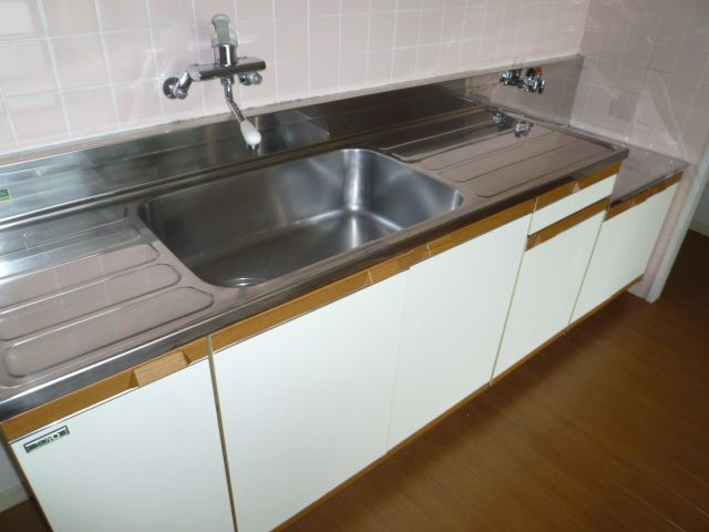 Kitchen. Sink and cooking space is widely reserved kitchen space. 