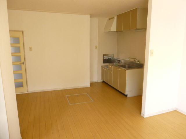 Living and room. The kitchen next to, There is also space for a refrigerator