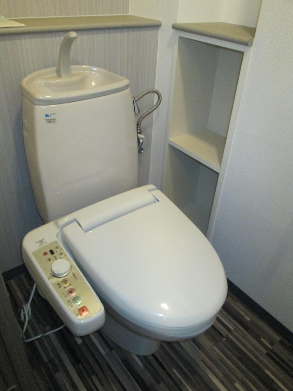 Toilet. Toilet with shower toilet seat