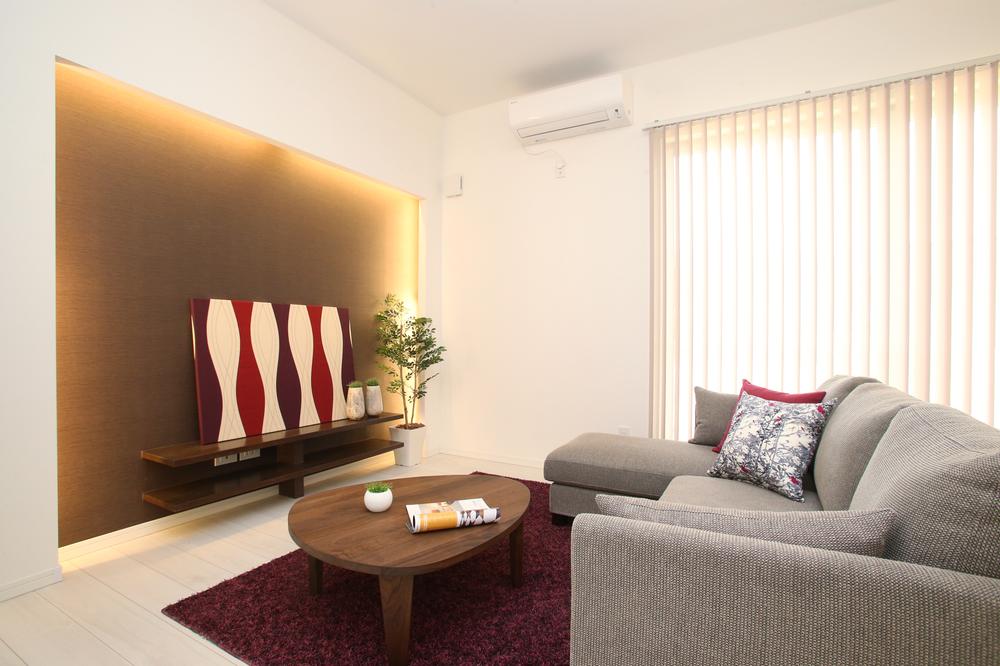 Living. Around the fixtures of the TV board has been applied indirect lighting. 