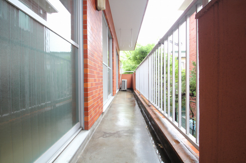 Balcony. A green is wide veranda. 