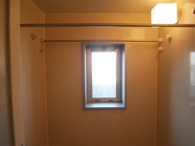 Bathroom. There is a window in the bathroom, You can natural ventilation.