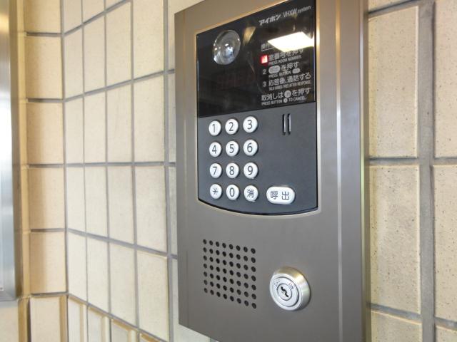 Entrance. It adopts the auto-lock with a monitor you can check the visitor.