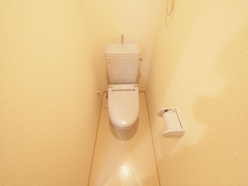 Toilet. Warm water washing toilet seat can be attached