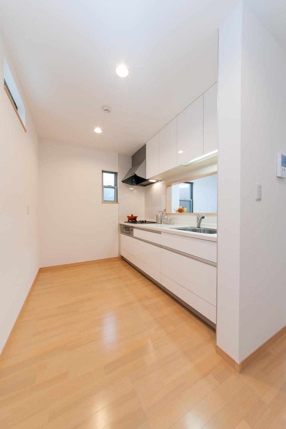 Kitchen. Wife safe design overlooking the living room from the kitchen. (A Building)