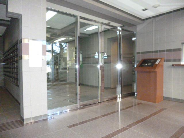 Entrance. Check the visitor in the auto lock with monitor