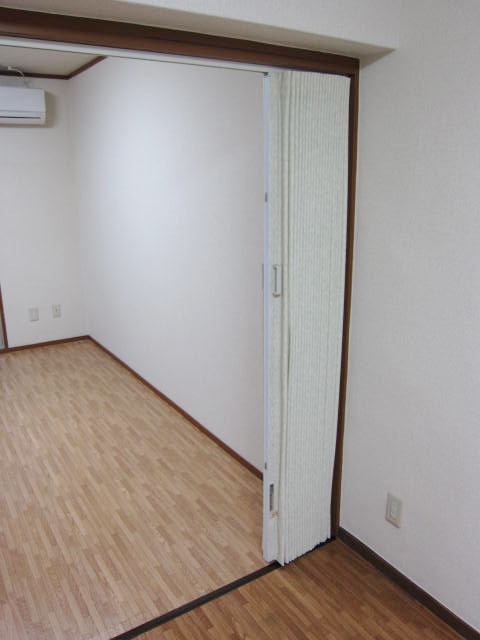 Other room space. Movable partition