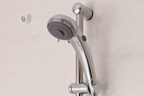 Bathing-wash room.  [Sliding shower bar] Shower bar of sliding to the height of the shower head can be adjusted freely have been installed (same specifications)