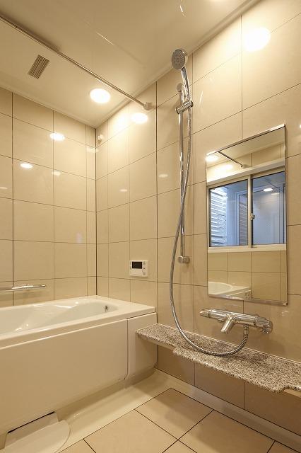 Bathroom. Unit bus classy bathroom is tiled. Ah quiche gallery is the original unit bus which was granite used to accent.