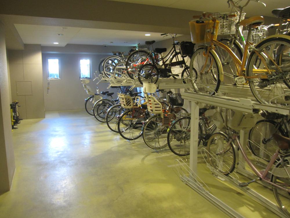 Other. Randomly placed tend to bicycle storage is
