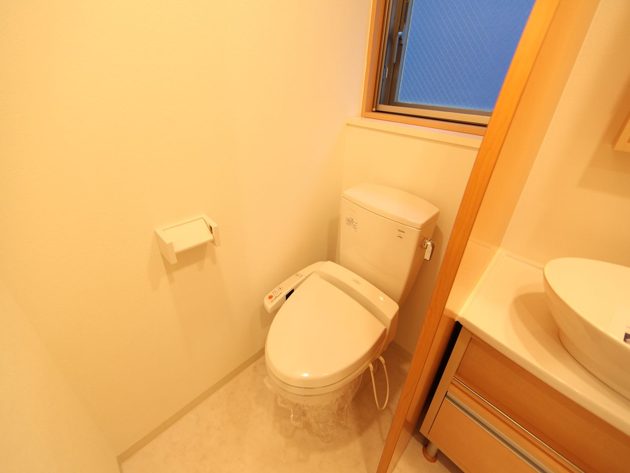 Toilet. Toilet with warm water washing toilet seat With windows (ventilation good)