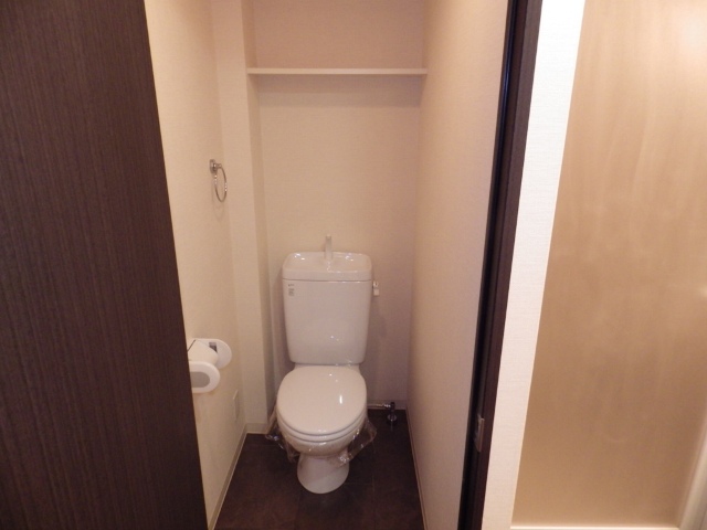 Toilet. There is housed in the upper part