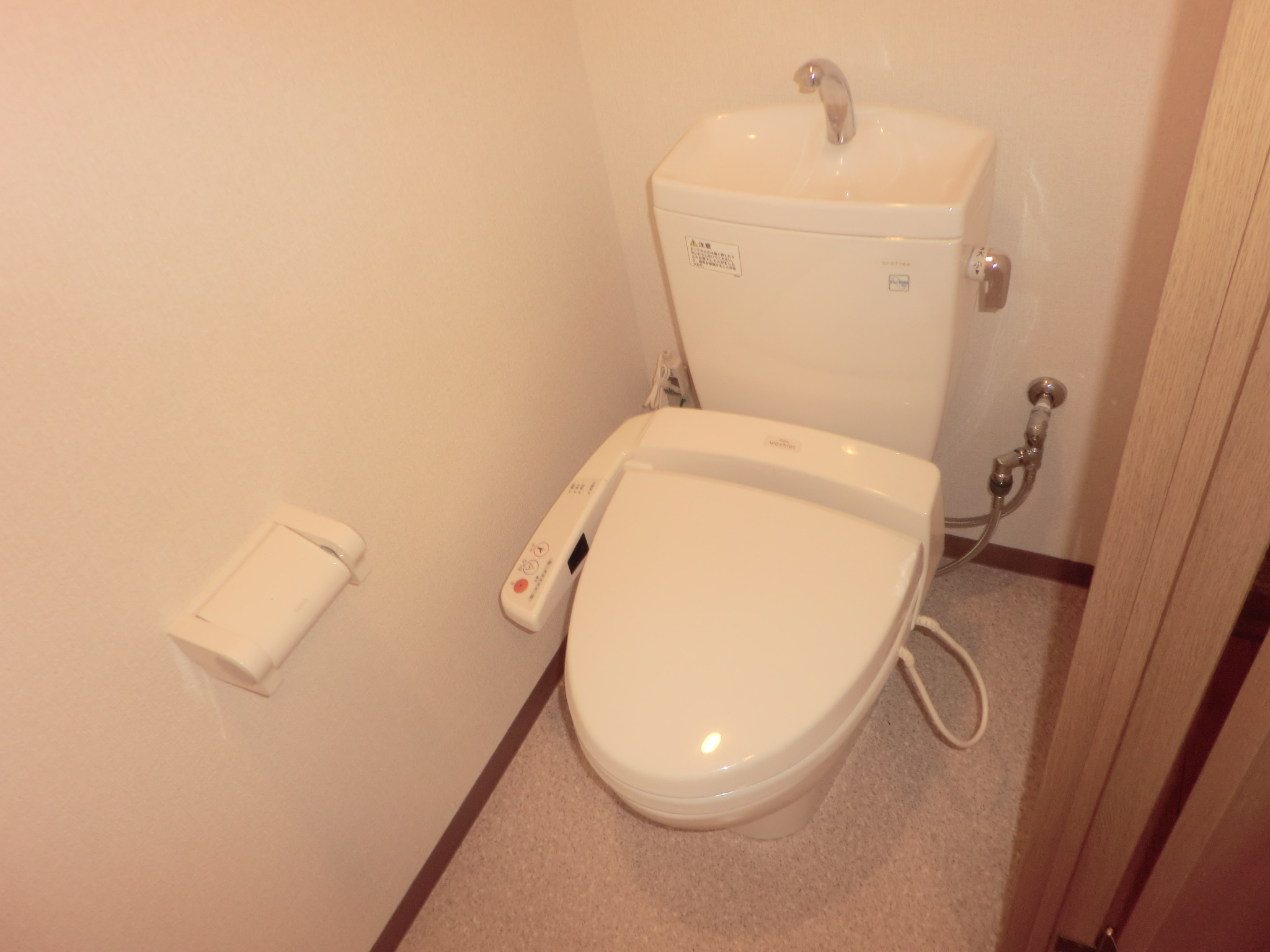 Toilet. Washlet also attached to clean life