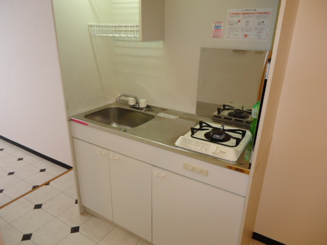 Kitchen. It is a compact system Kitchen. 