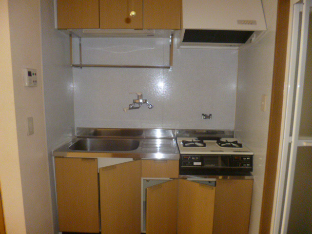 Kitchen. Two-burner gas stove with kitchen