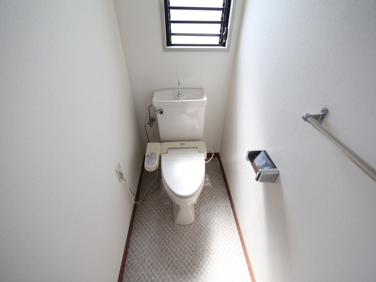 Toilet. Toilet with warm water washing toilet seat With windows (ventilation good)